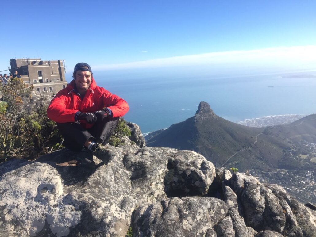 Andrew Patterson curates transformational incentive activities in South Africa, including climbing Table Mountain.
