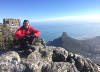 Andrew Patterson curates transformational incentive activities in South Africa, including climbing Table Mountain.