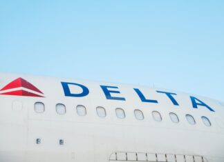 FAA Investigates Delta, CEO Apologizes as Delays Drag On