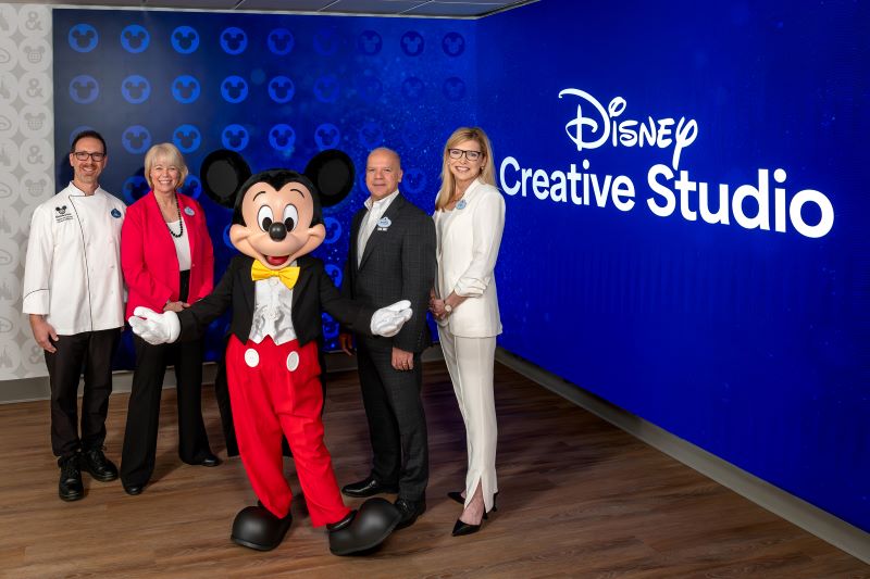 Pictured (left to right) are Anthony De Luca, culinary director of Disney Catered Events; Amy Pfeiffer, director of Disney Meetings & Events; Mickey Mouse; Ramiro Vazquez, vice president of Walt Disney World Gatherings; and Cindy Garber, director of Disney Event Group.