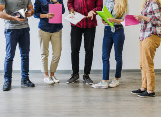 gen z students with notebooks