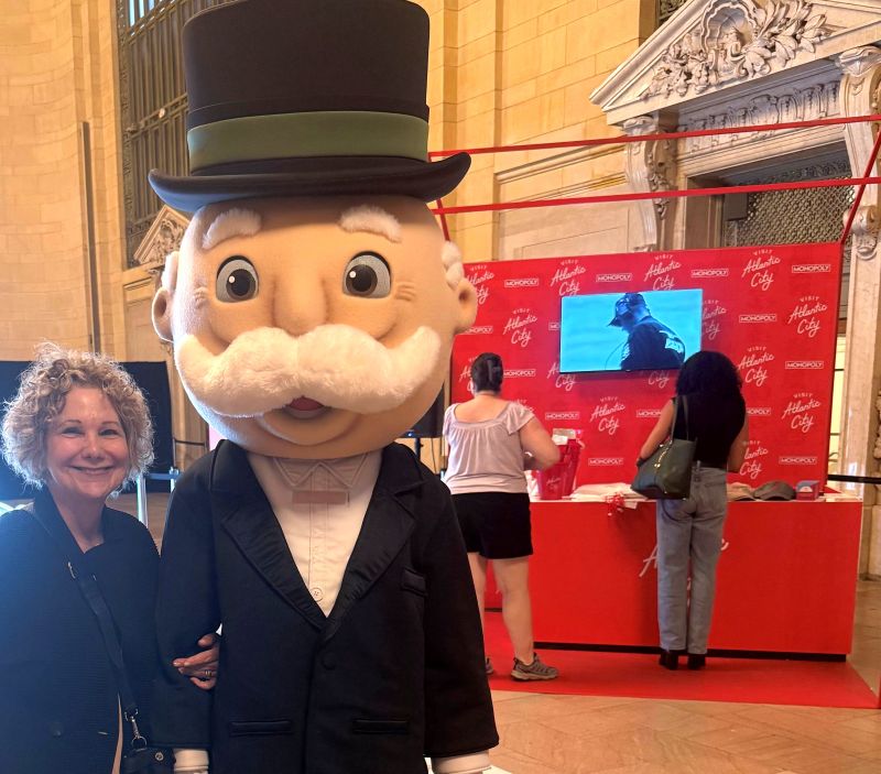 Prevue Editorial Director Laurel Herman meets Mr. Monopoly at the Atlantic City activation.